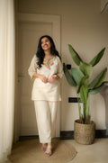 Stylish embroide co-ord set with tassel detailing and coordinated kurti and pant