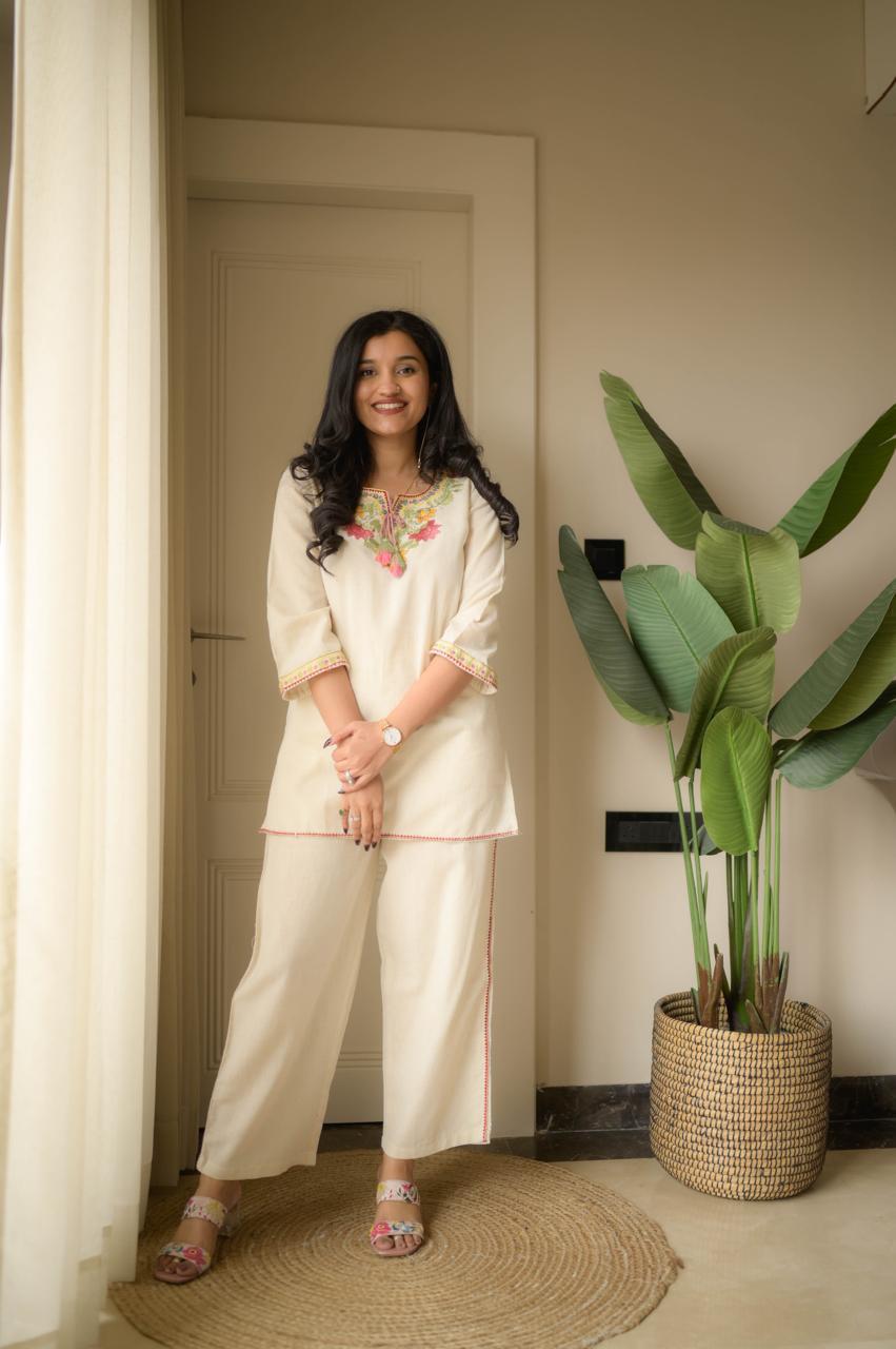 Stylish embroide co-ord set with tassel detailing and coordinated kurti and pant