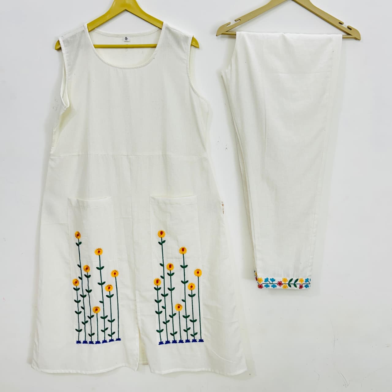 Premium sleeveless co-ord set with intricate threadwork detailing and elegant straight-fit silhouette