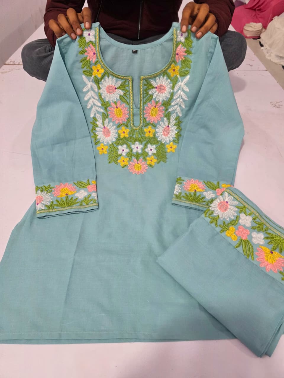 Premium embroidered co-ord set with handcrafted detailing and coordinated kurti and plazo
