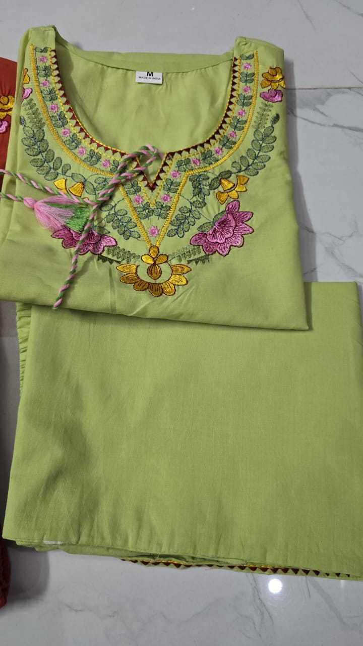 Premium embroidered co-ord set with tassel detailing and coordinated kurti and pant