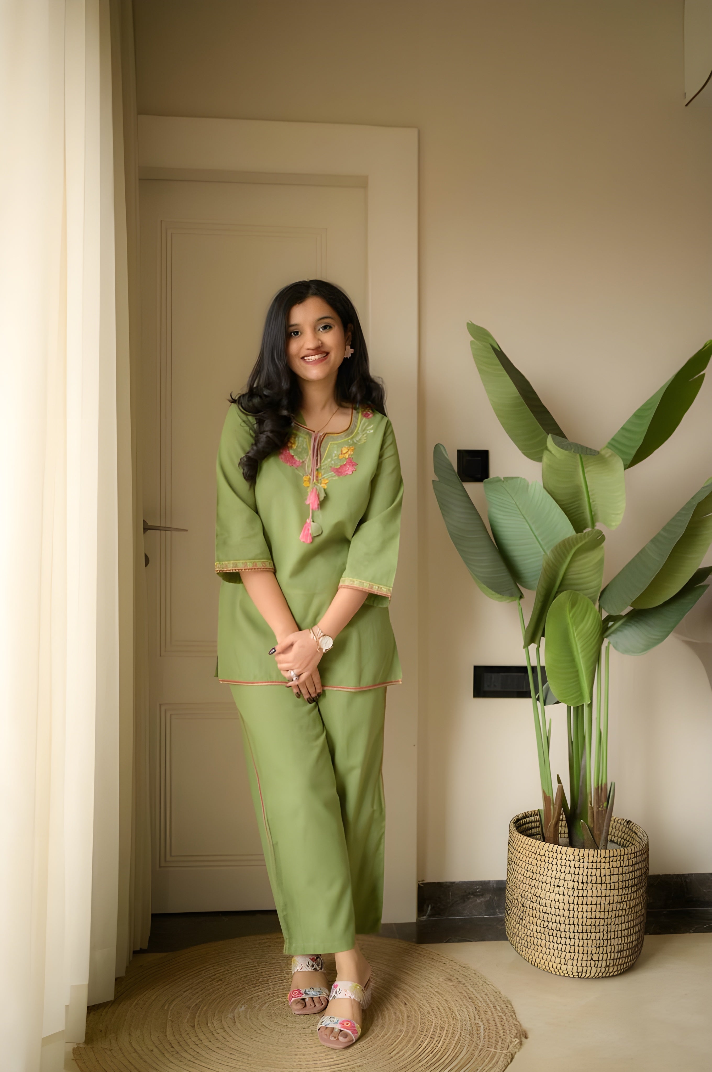 Premium embroidered co-ord set with tassel detailing and coordinated kurti and pant