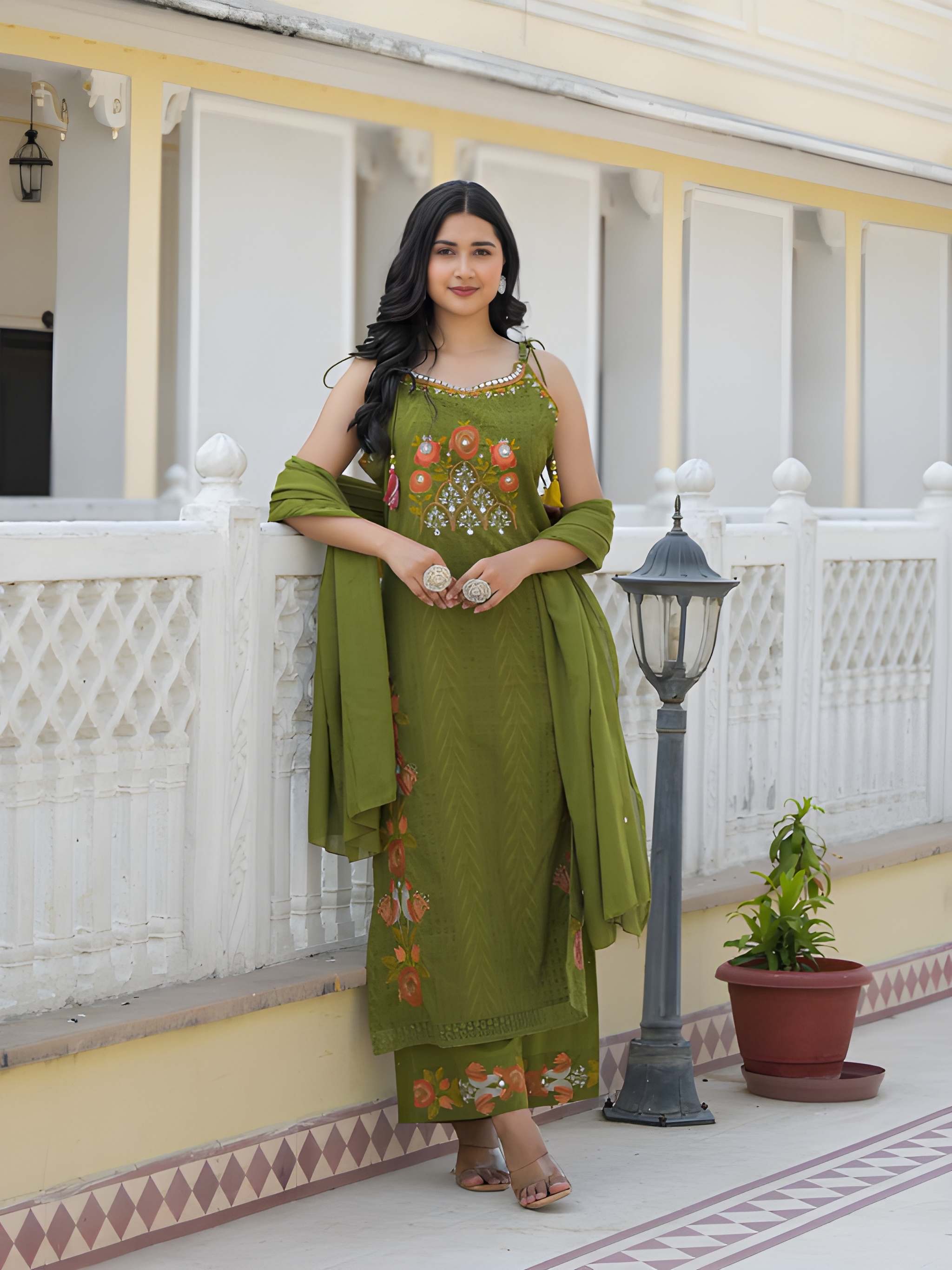 Premium cotton embroidered sleeveless kurti set with elegant festive detailing