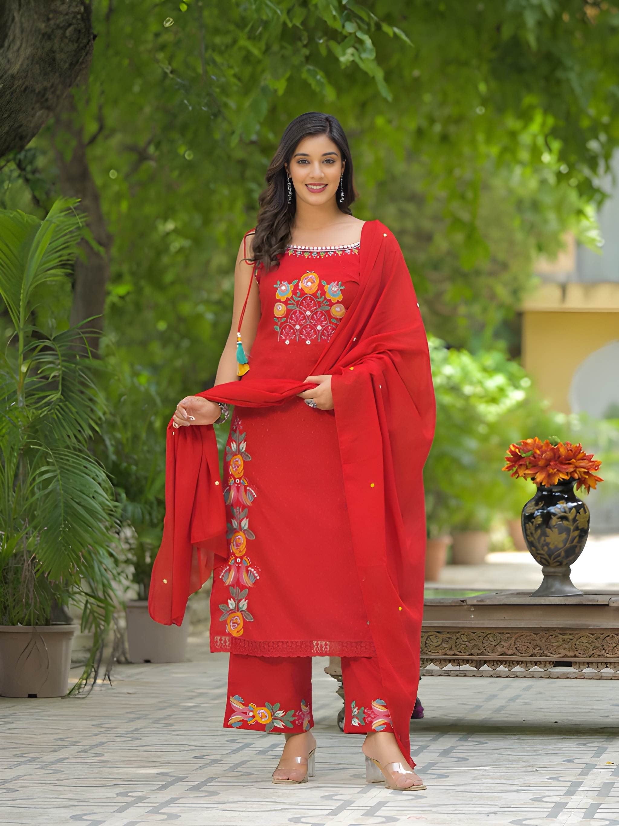 Premium cotton embroidered sleeveless kurti set with elegant festive detailing