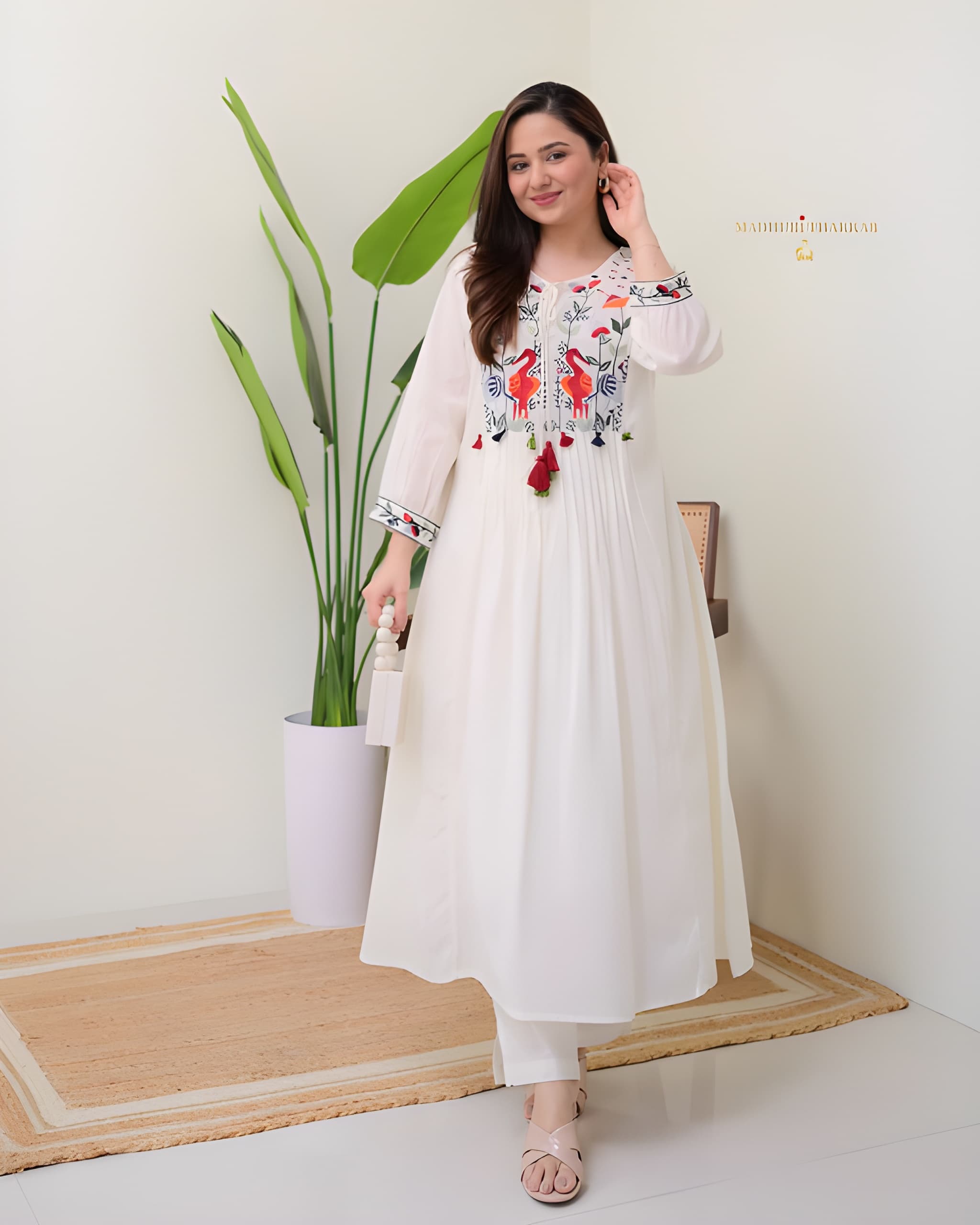 Premium pure cotton embroidered kurta set with elegant pleating and handcrafted yoke detailing