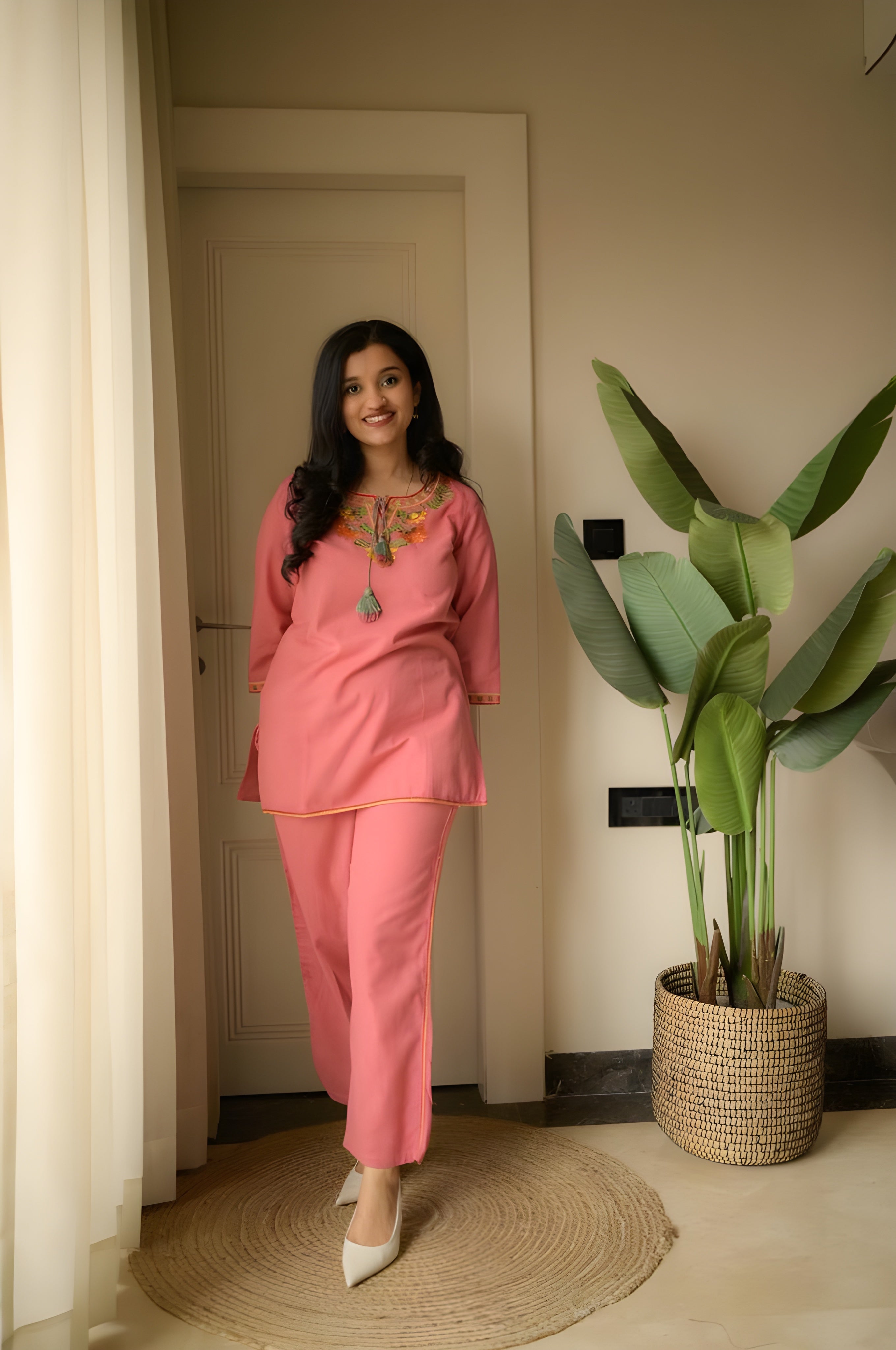 Premium embroidered co-ord set with tassel detailing and coordinated kurti and pant