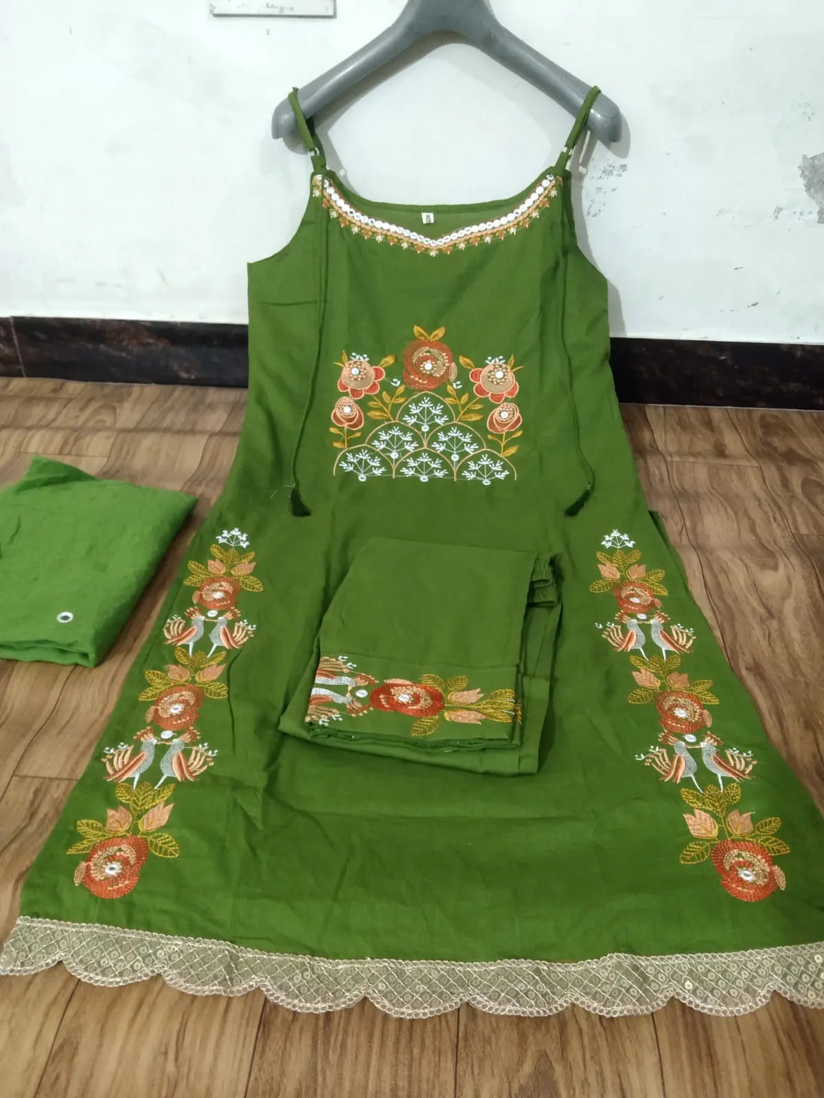 Premium cotton embroidered sleeveless kurti set with elegant festive detailing