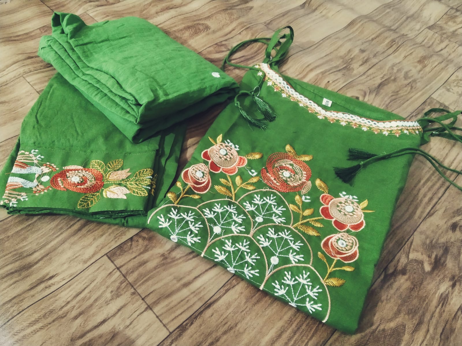 Premium cotton embroidered sleeveless kurti set with elegant festive detailing
