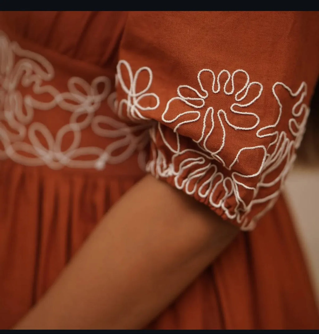 Classy cotton gown dress with embroidered detailing and graceful summer silhouette