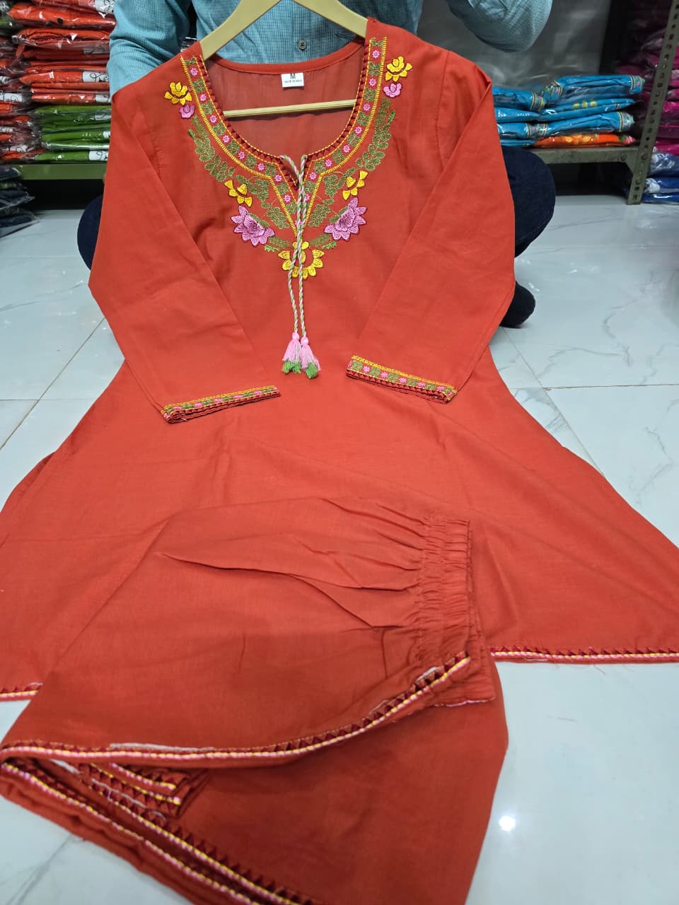 Premium embroidered co-ord set with tassel detailing and coordinated kurti and pant