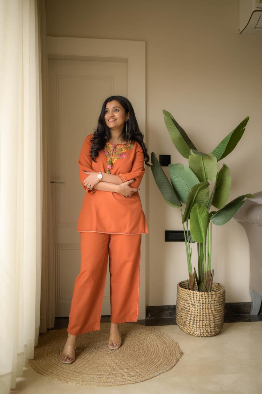Premium embroidered co-ord set with tassel detailing and coordinated kurti and pant