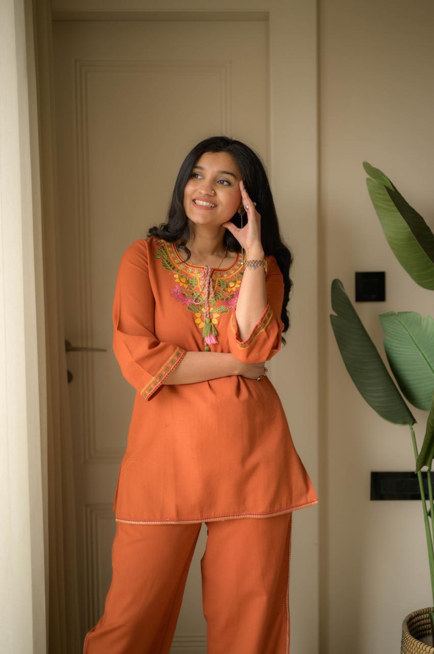 Premium embroidered co-ord set with tassel detailing and coordinated kurti and pant
