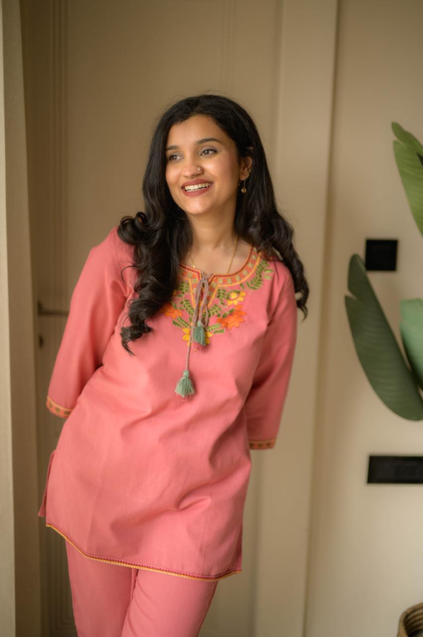 Premium embroidered co-ord set with tassel detailing and coordinated kurti and pant