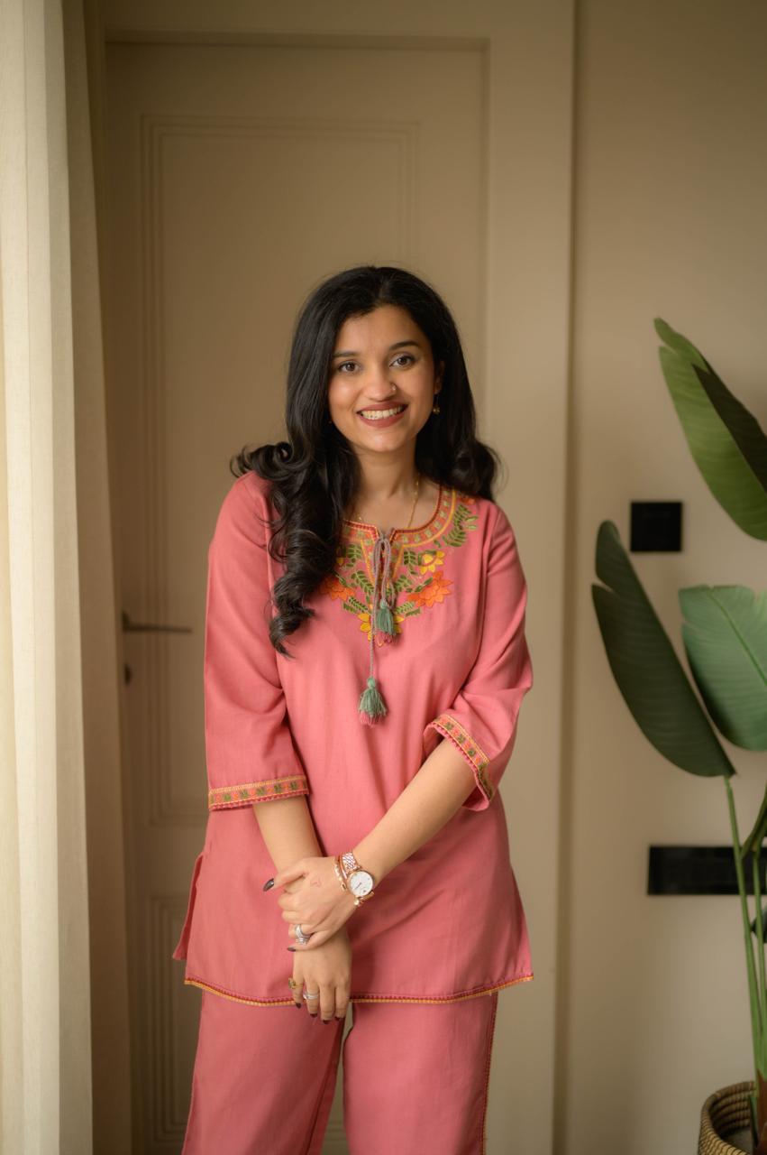 Premium embroidered co-ord set with tassel detailing and coordinated kurti and pant