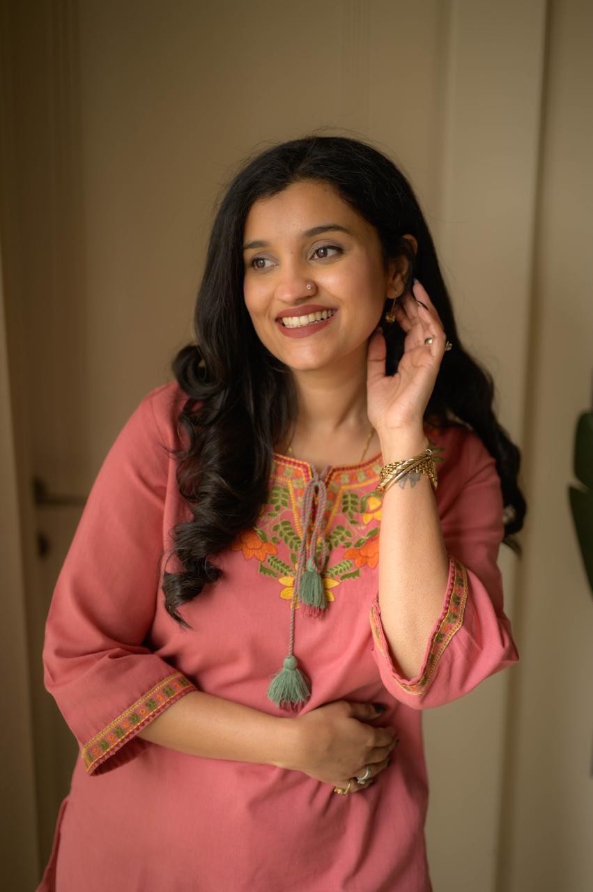 Premium embroidered co-ord set with tassel detailing and coordinated kurti and pant