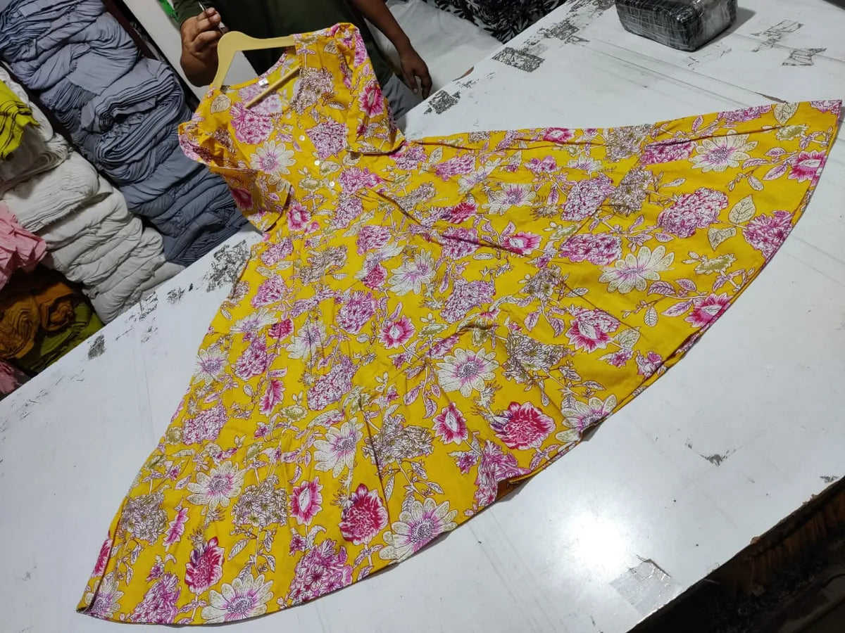 Beautiful Yellow Cotton Midi Kurti with Floral Print and Puff Sleeves